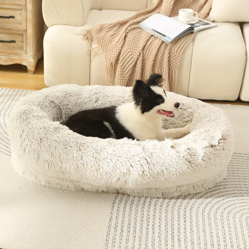 Washable Oval Donut Pet Bed shown in a home setting (view 3)