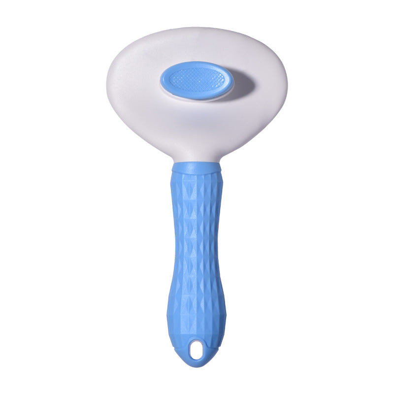 The one-click slicker brush head-on, showing the oval pin head and ribbed handle