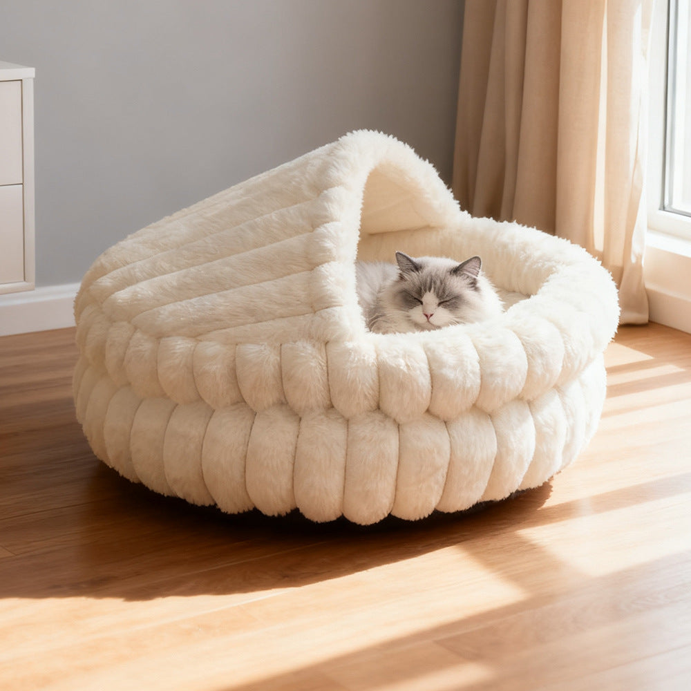 Hooded Plush Cat Cave Bed shown in a home setting