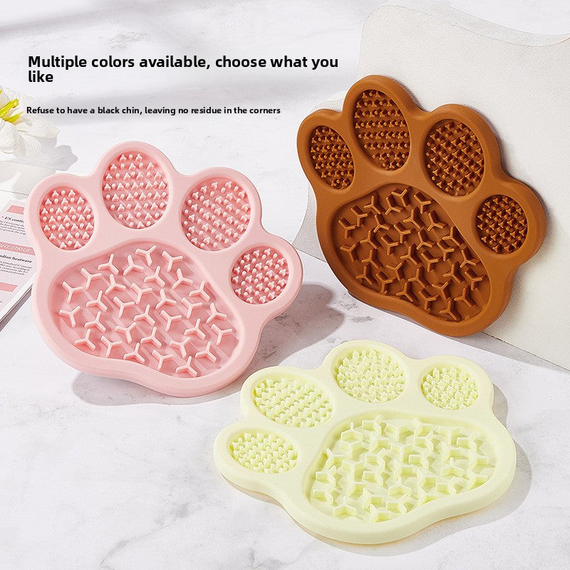 Paw-Shaped Silicone Lick Mat for Dogs & Cats shown in a home setting