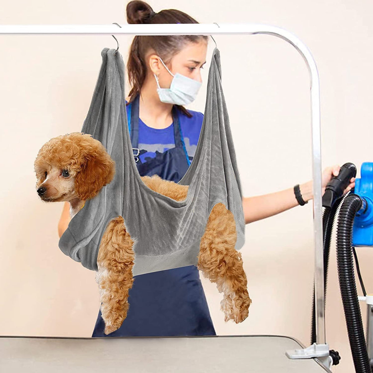 Fleece Pet Grooming Hammock with Hooks shown in a home setting (view 2)