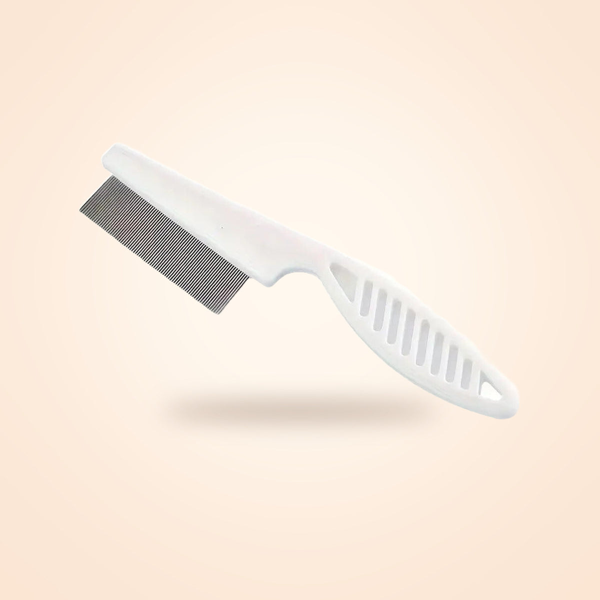 White flea comb with fine stainless steel teeth, on a warm cream background