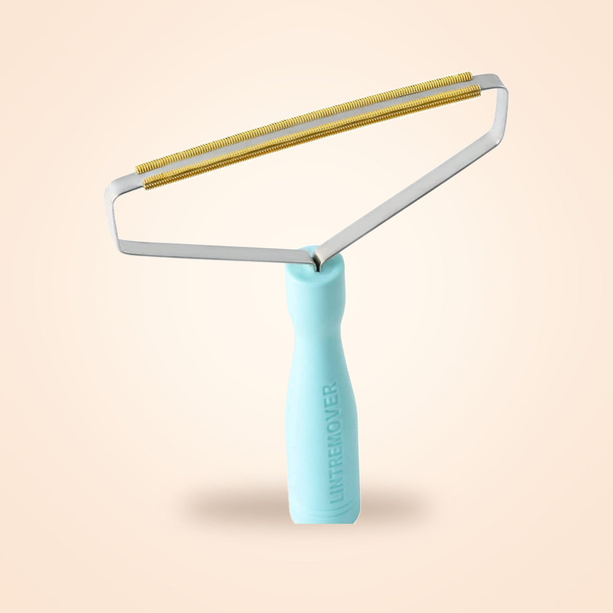 The reusable lint and pet hair remover with a mint green handle and a copper blade in a steel frame
