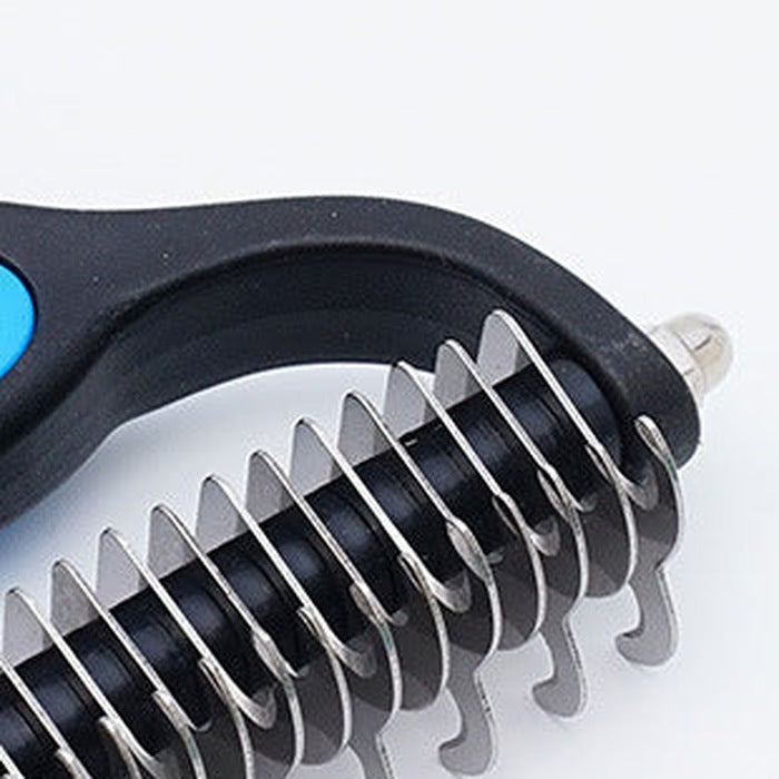 Close-up of the comb's curved stainless steel blades