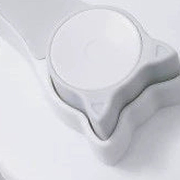 Close-up of the cat-ear shaped release button on the back of the head