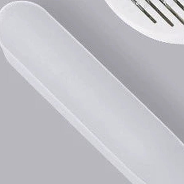 Close-up of the slim handle where it meets the round brush head