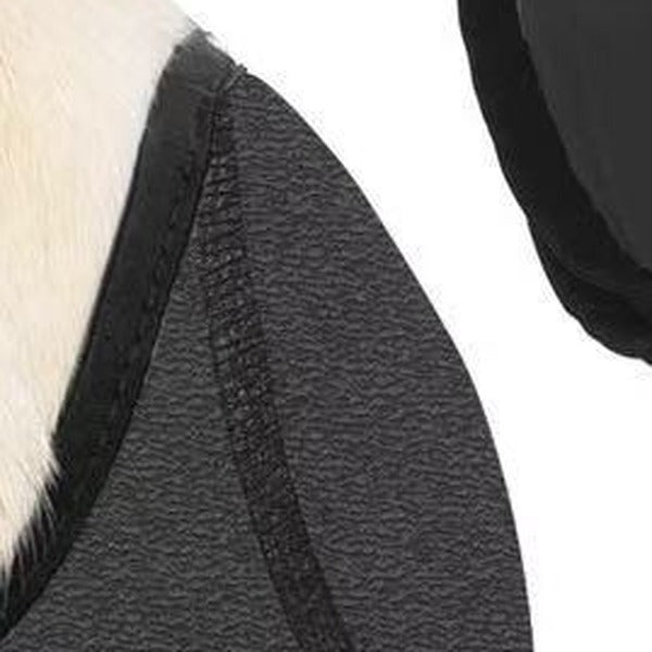 Close-up of the bound edge of the wrap where it covers the ear