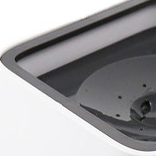 Close-up of the top cover and the plate sitting on the water