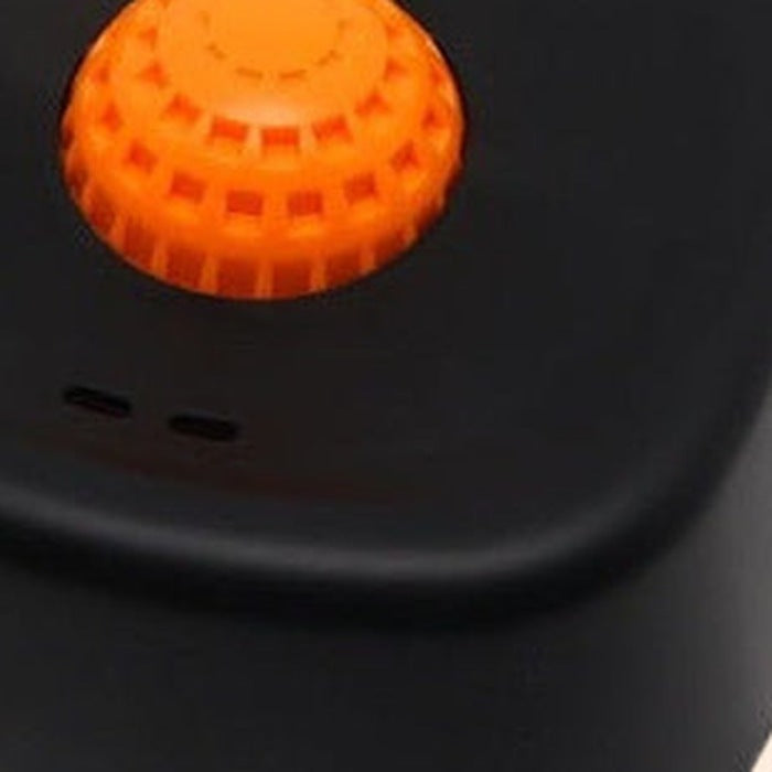 Close-up of the bowl body and the vent slots below the ball