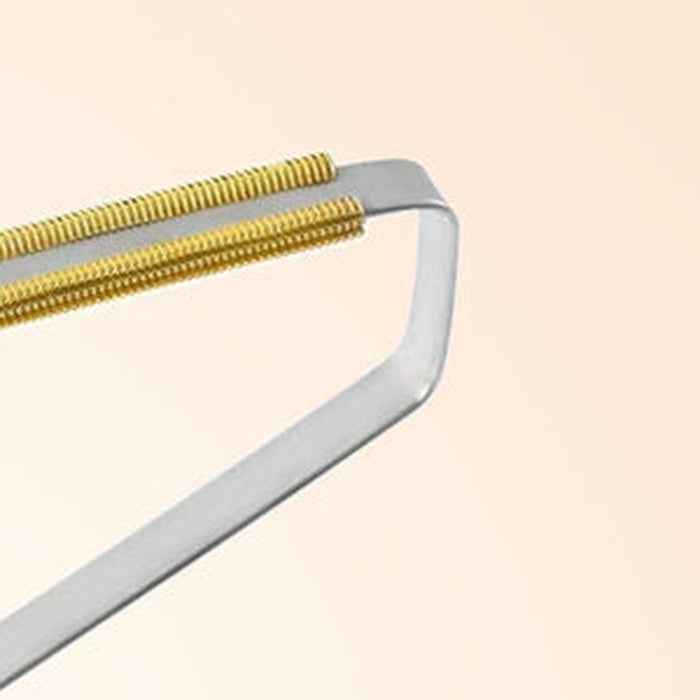 Close-up of the corner where the metal edge meets the frame
