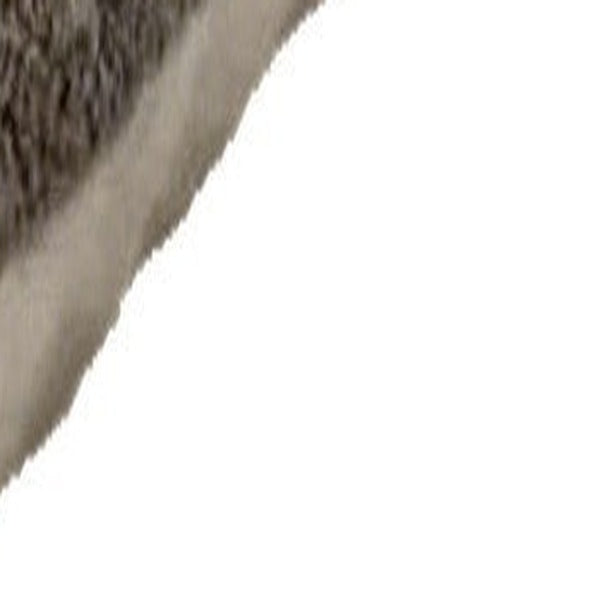 Close-up of the mat's edge where both plush faces meet