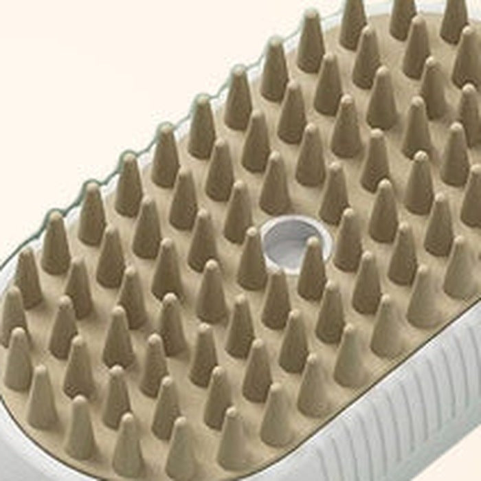 Close-up of the rounded flexible bristles on the mist grooming brush