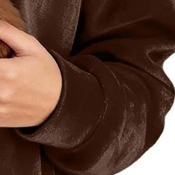 Close-up of the thick velvet fabric on the sleeve