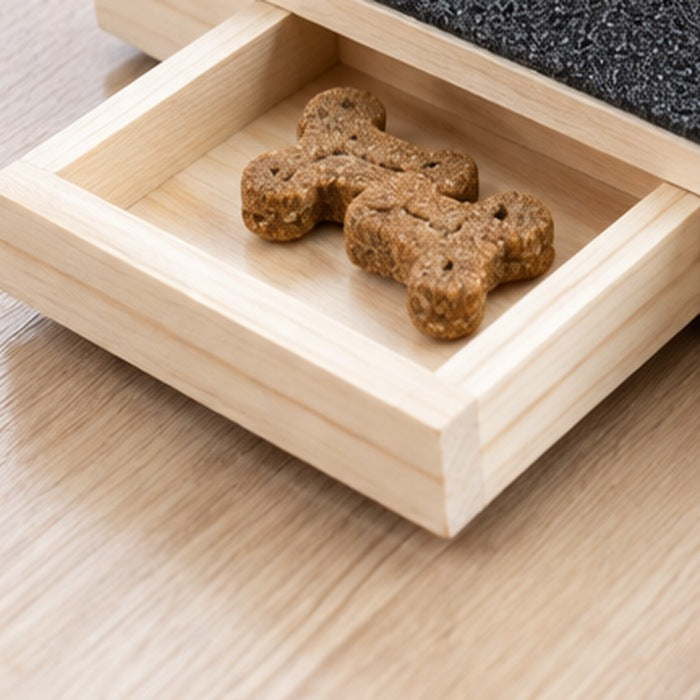 Close-up of the scratch board's pull-out treat drawer
