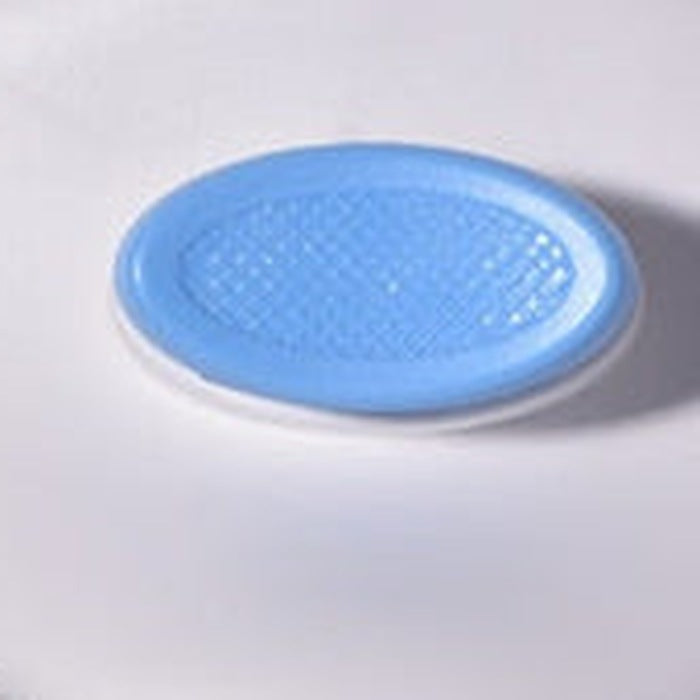 Close-up of the brush's blue oval release button