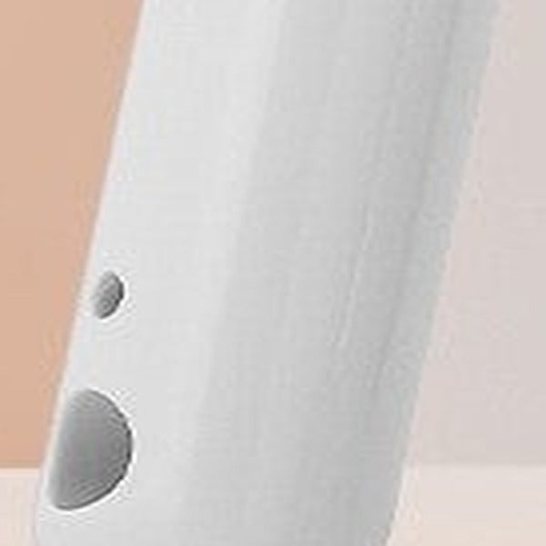 Close-up of the handle and its two recessed buttons